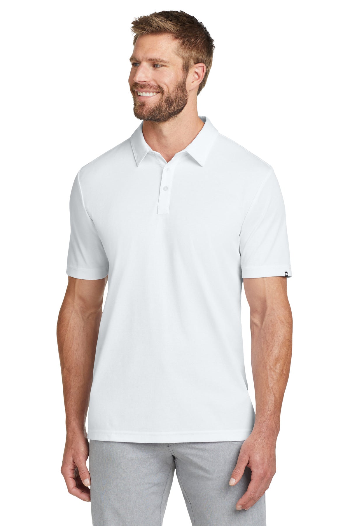 Custom logo TravisMathew Oceanside Solid Polo. TM1MU411 in White