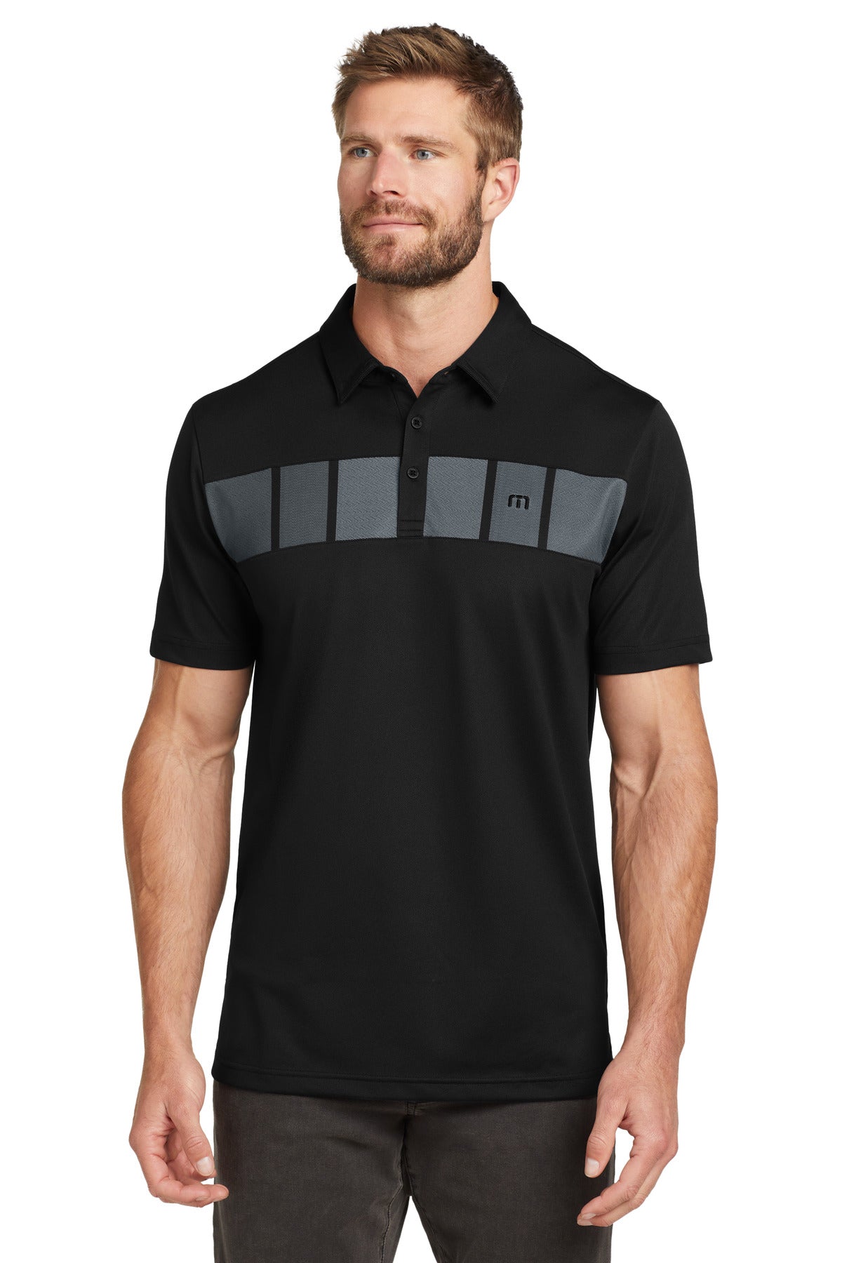 Custom logo TravisMathew Cabana Chest Stripe Polo. TM1MU416 in Black
